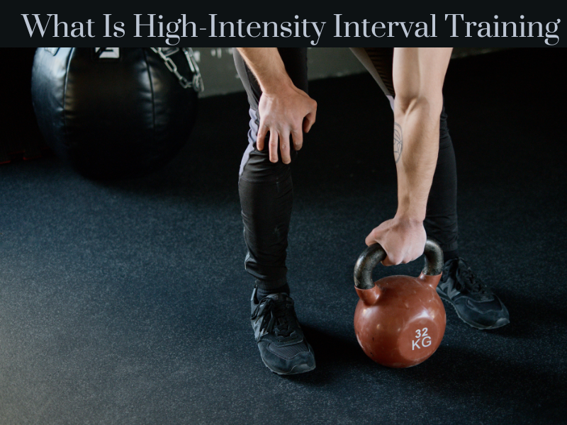 A man about to do kettlebell swings with a 32KG kettlebell.