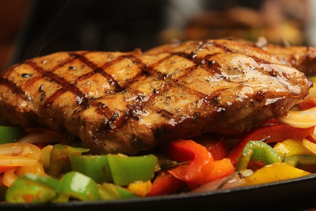 Grilled chicken over veggies